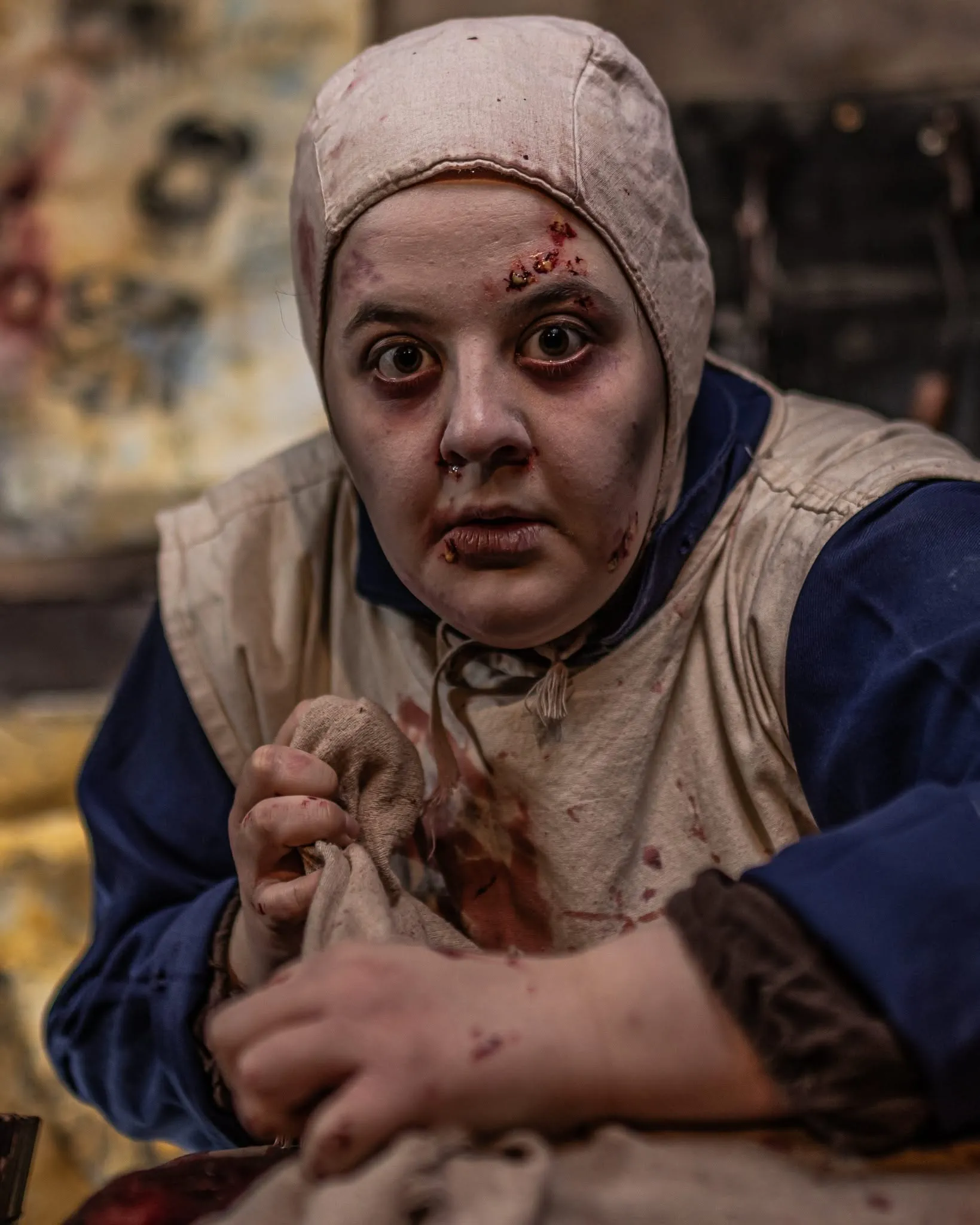 Plague nurse in a York Dungeon immersive tour.