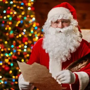 Santa holding a piece of paper