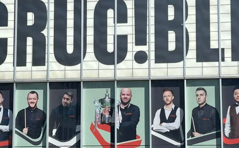 Outside of the Crucible Theatre with pictures of worls snooker players.