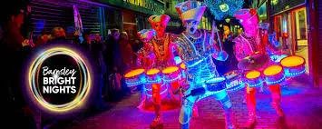 Illuminated light sculptures and festival crowds at Barnsley Bright Nights