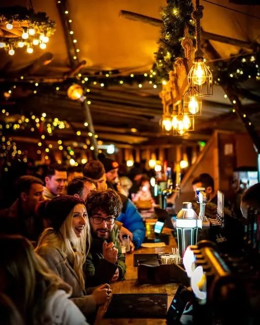 Festive market chalets and illuminated True North Tipi inside The Glass Works Square Barnsley