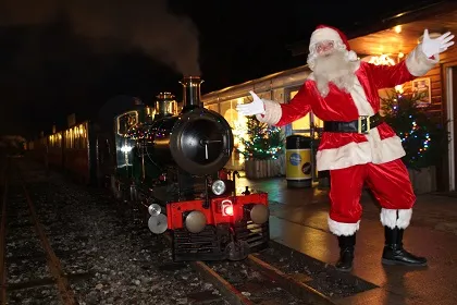 Whistlestop Valley heritage steam train decorated for the Santa Express in Clayton West