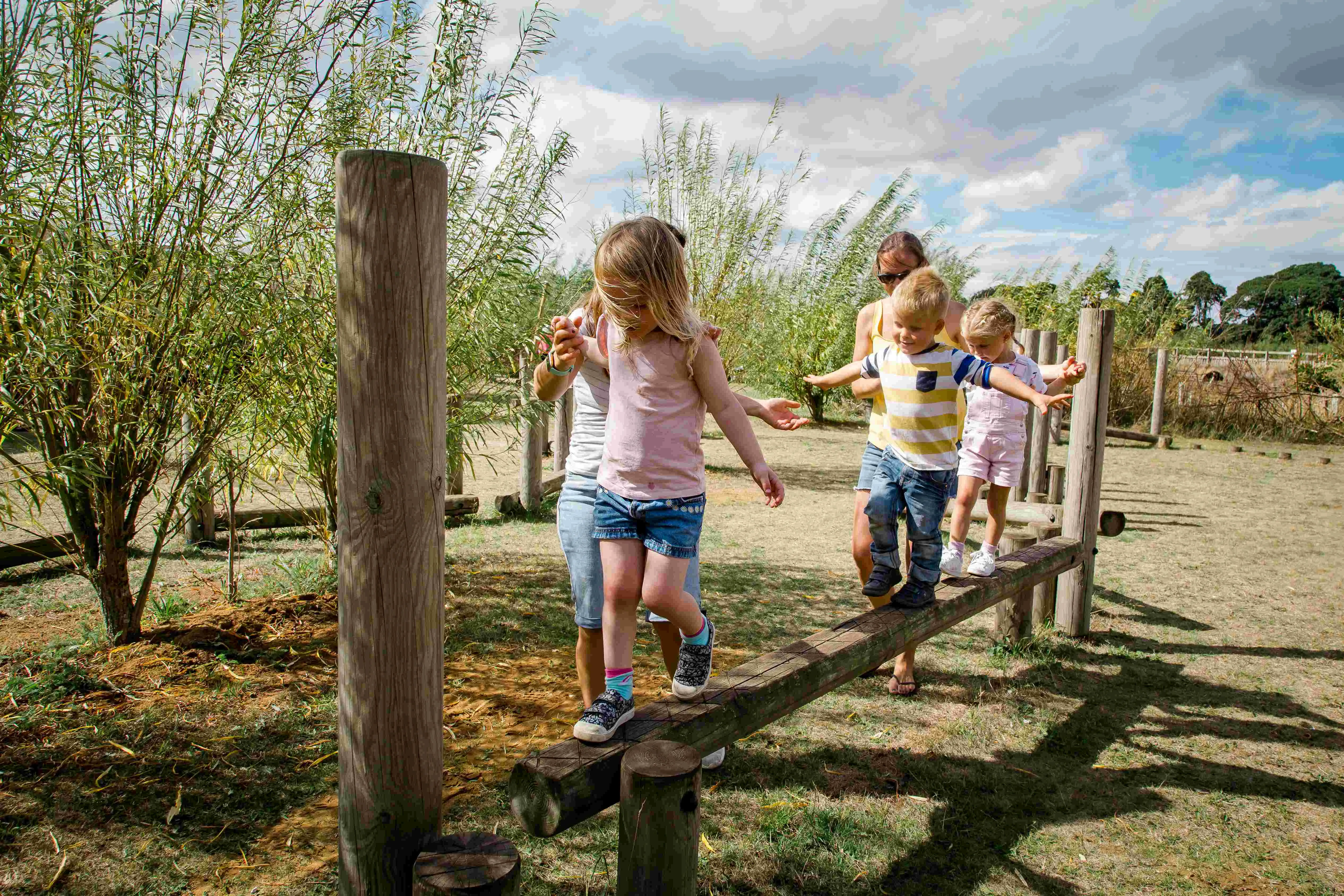 Children in the play area at Woldies outdoor family fun.