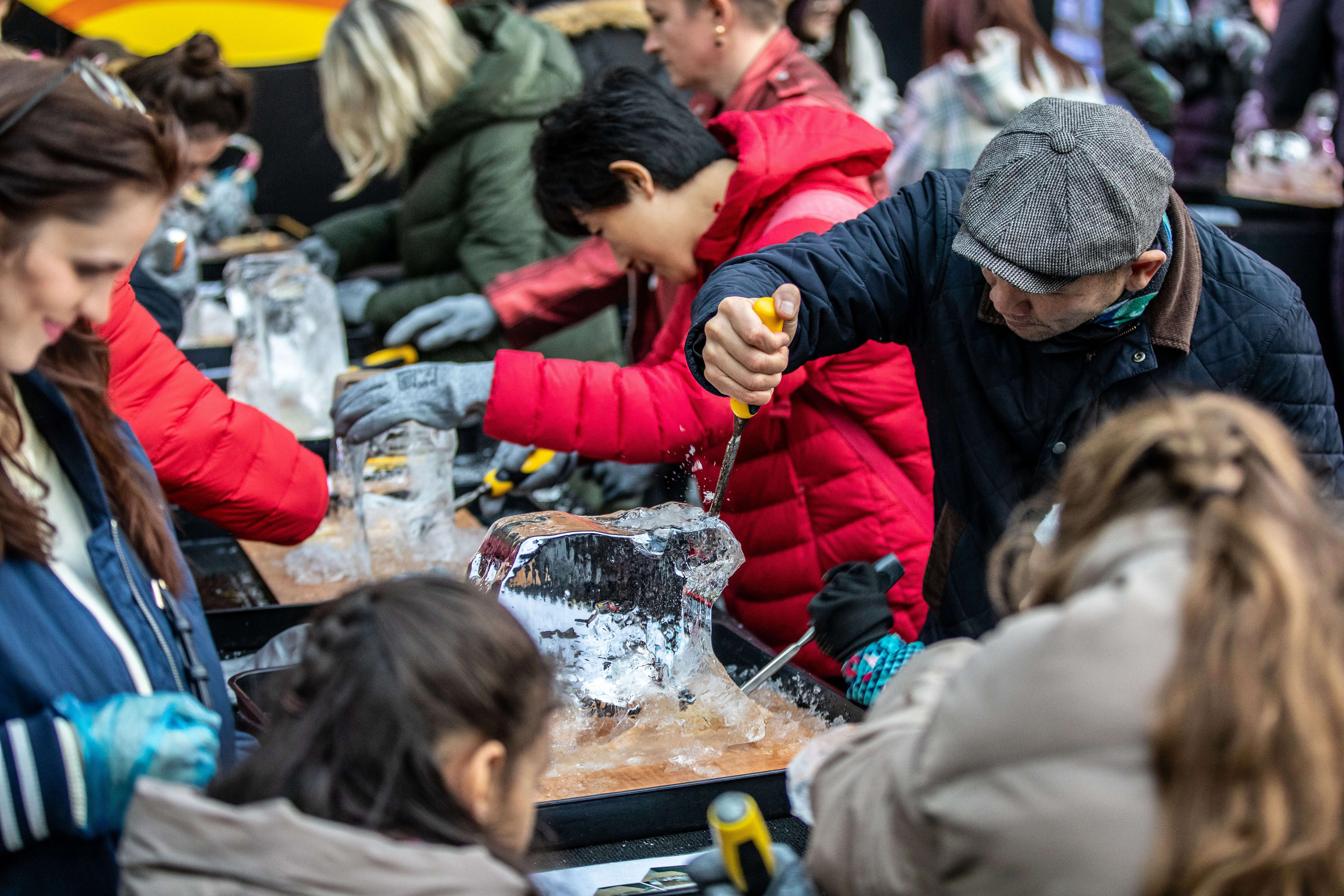 Visitors taking part in an ice sculpture master class one of the activities available in York Ice Trail weekend