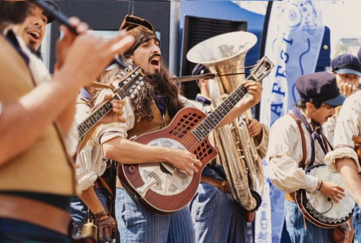 folk band with instruments performing at Scarboorugh Seafest