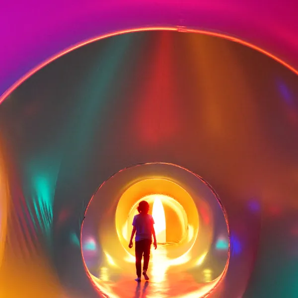 child inside the luminarium, a giant inflatable labyrinth of light, which will be in Harrogate in June 2026
