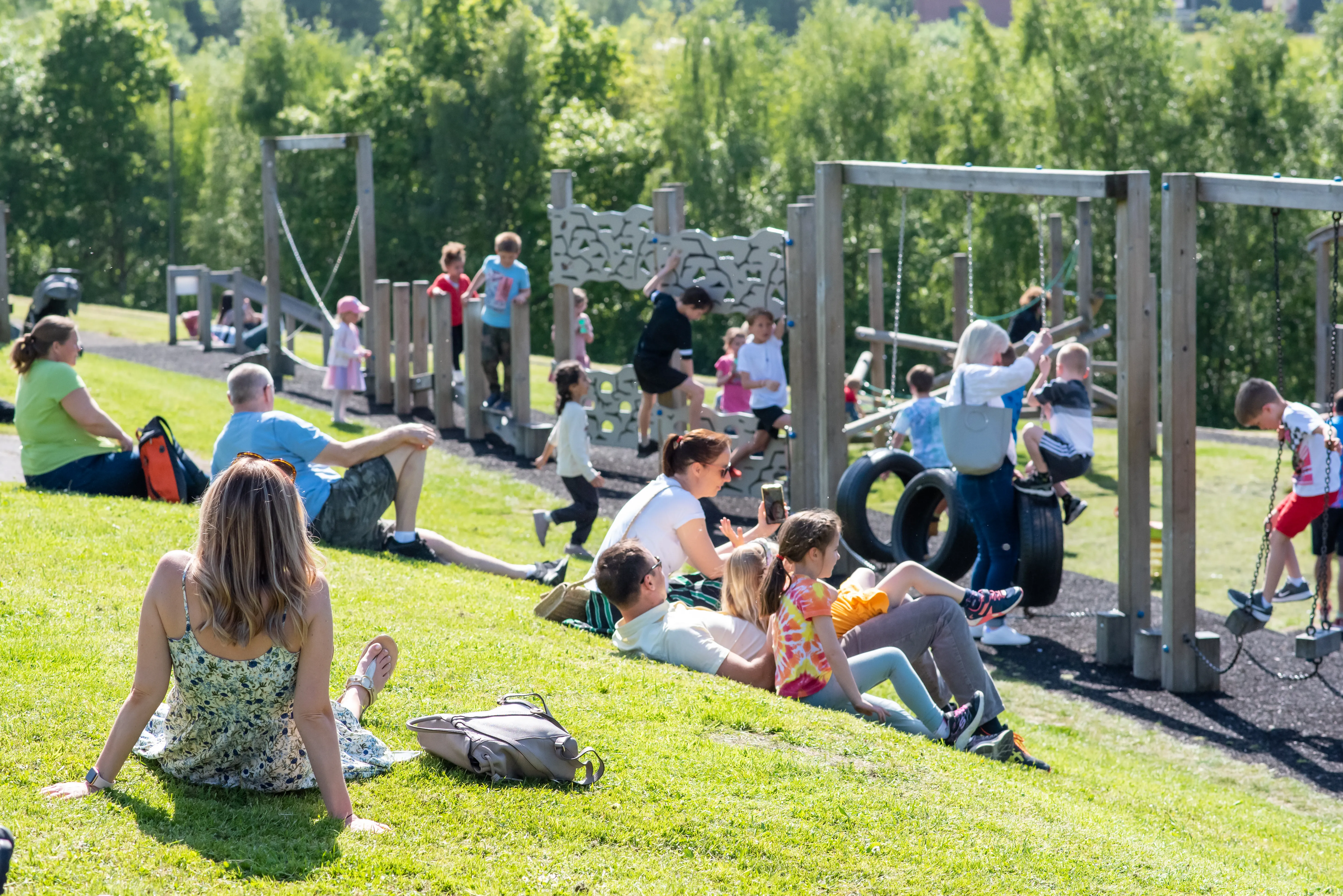 Families enjoying the adventure playground at the National Coal Mining Museum.