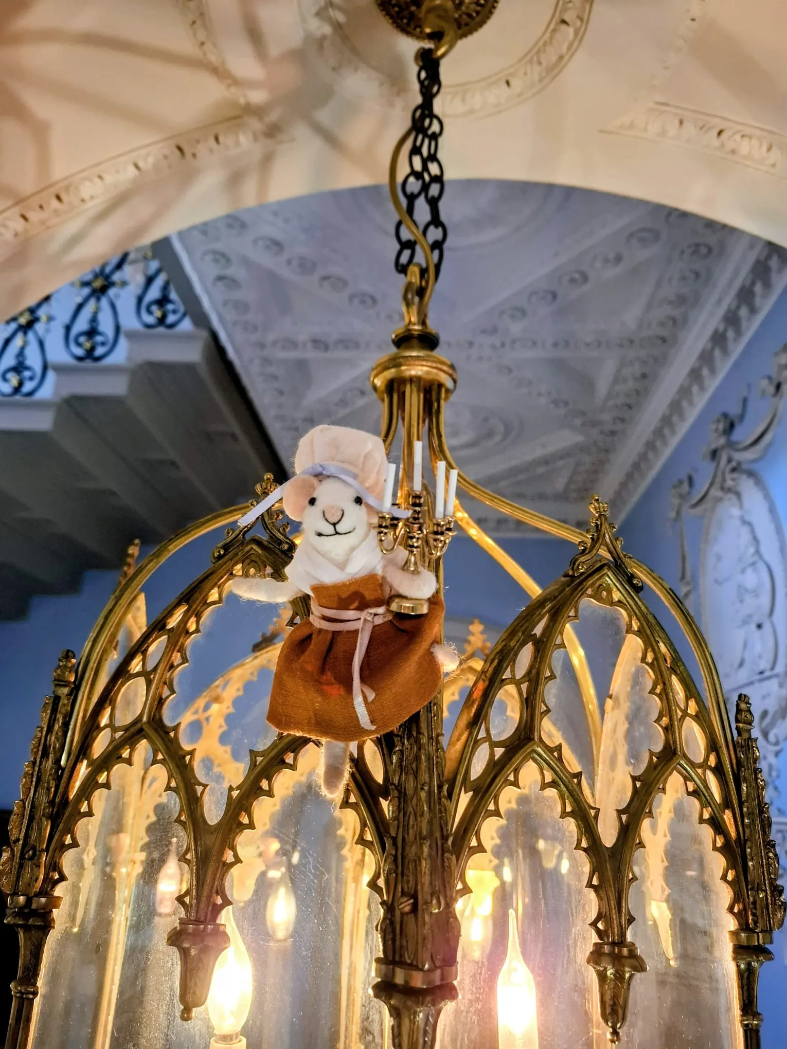 small mouse doll in a chandelier at Fairfax house part of the mid-summer-mouse trail