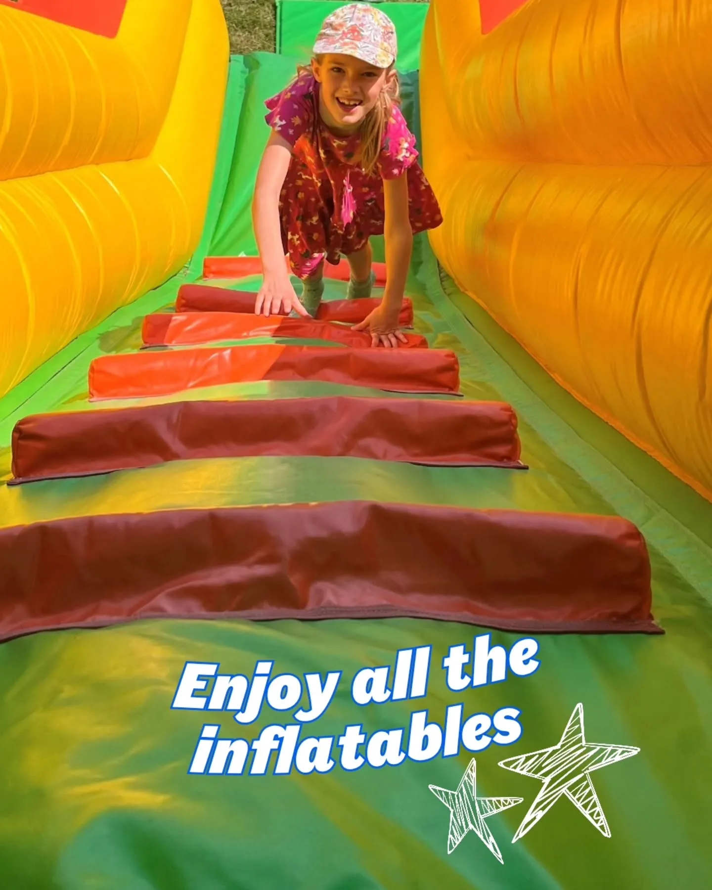 children playing in the seasdie zone, summer fun area in York. 