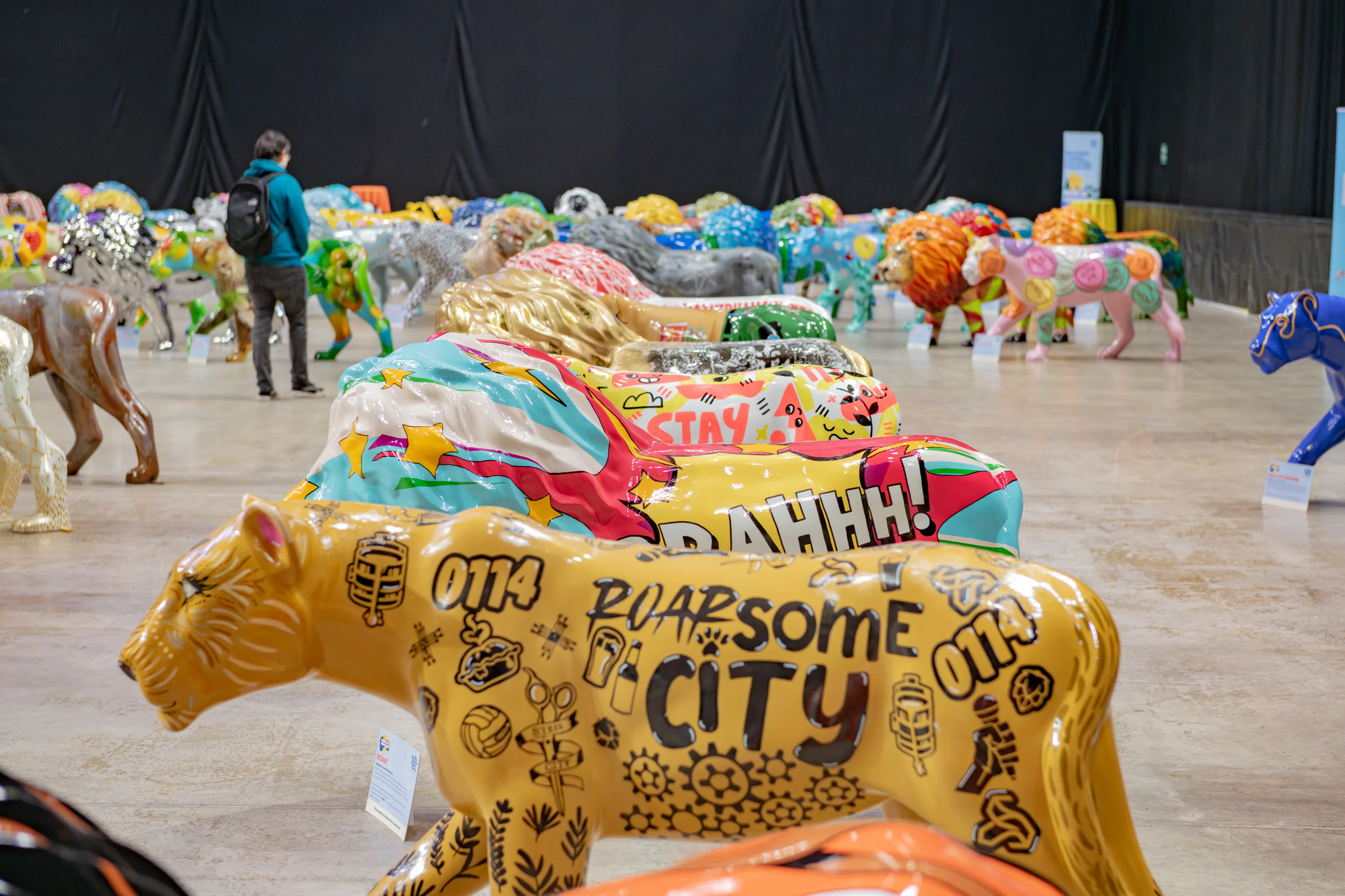 several of the Pride of Yorkshire lion sculptures at Shefield Arena.