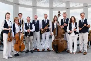 The Scarbourgh Spa orchestra standing together in the spa in Scarborough.
