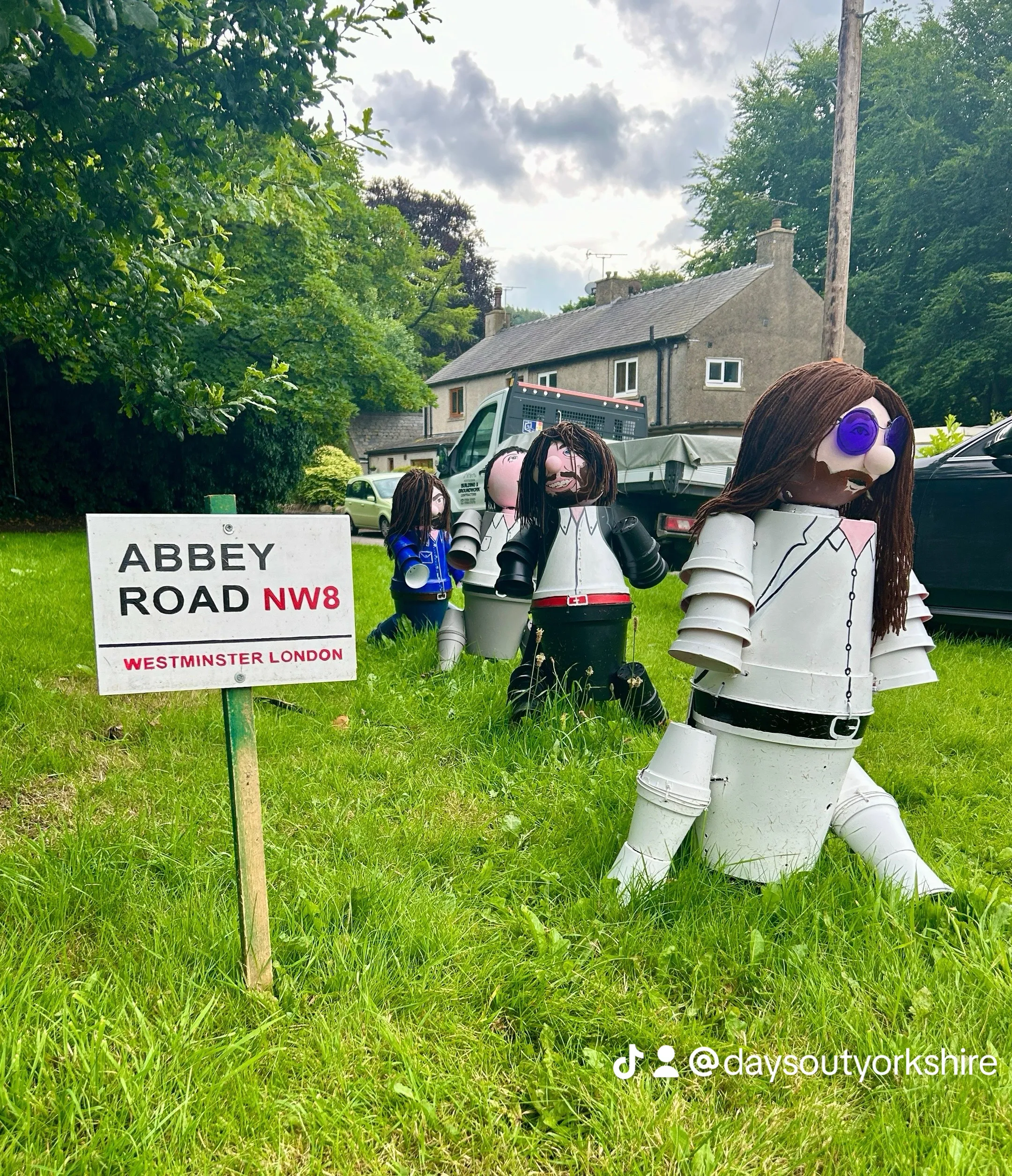 The Beatles made of flowerpots at the free summer flowerpot trail in Settle, Yorkshire Dales