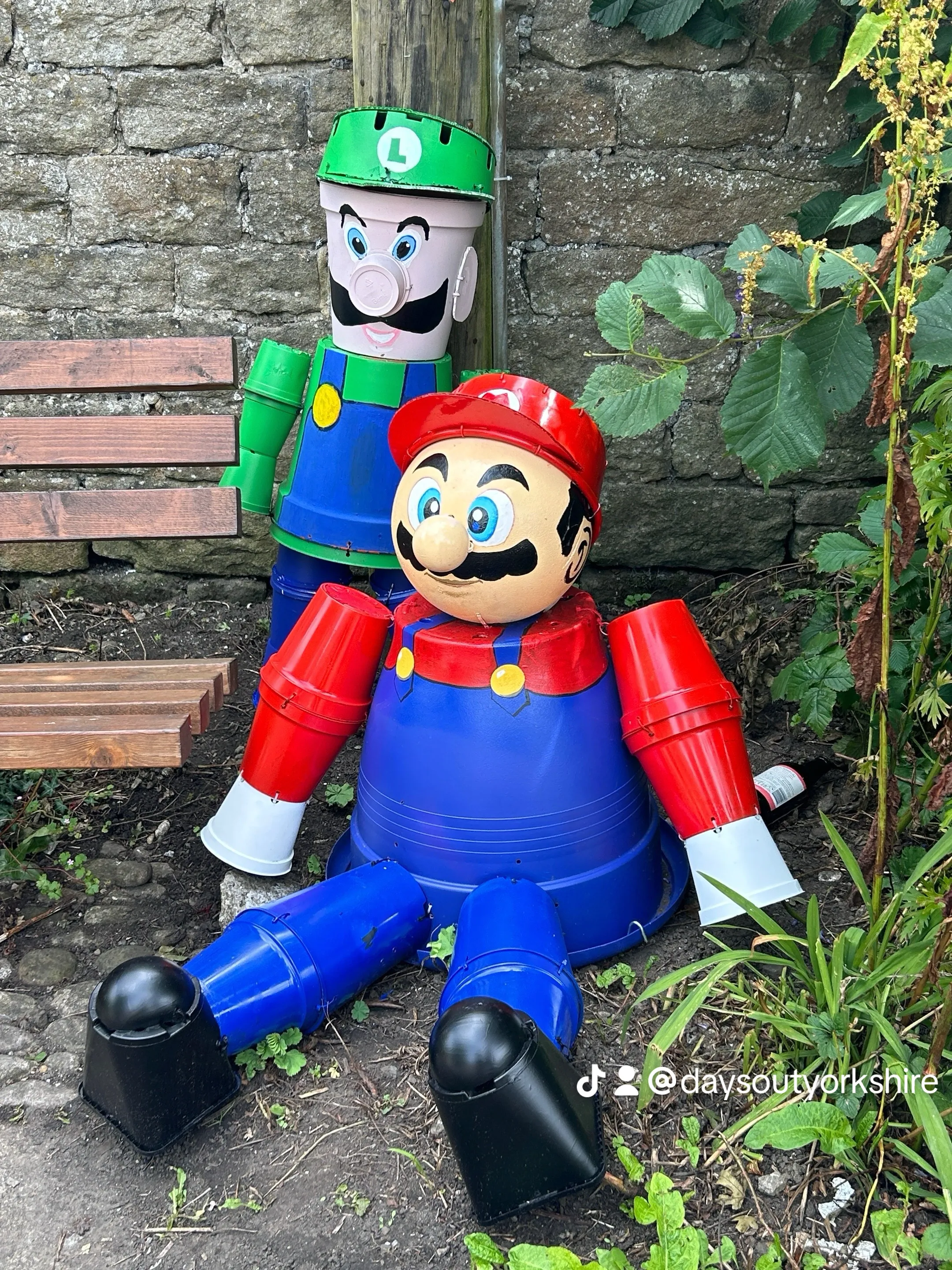 Mario and Luigi made from flowerpots at the Settle Flowerpot Festival in the Yorkshire Dales