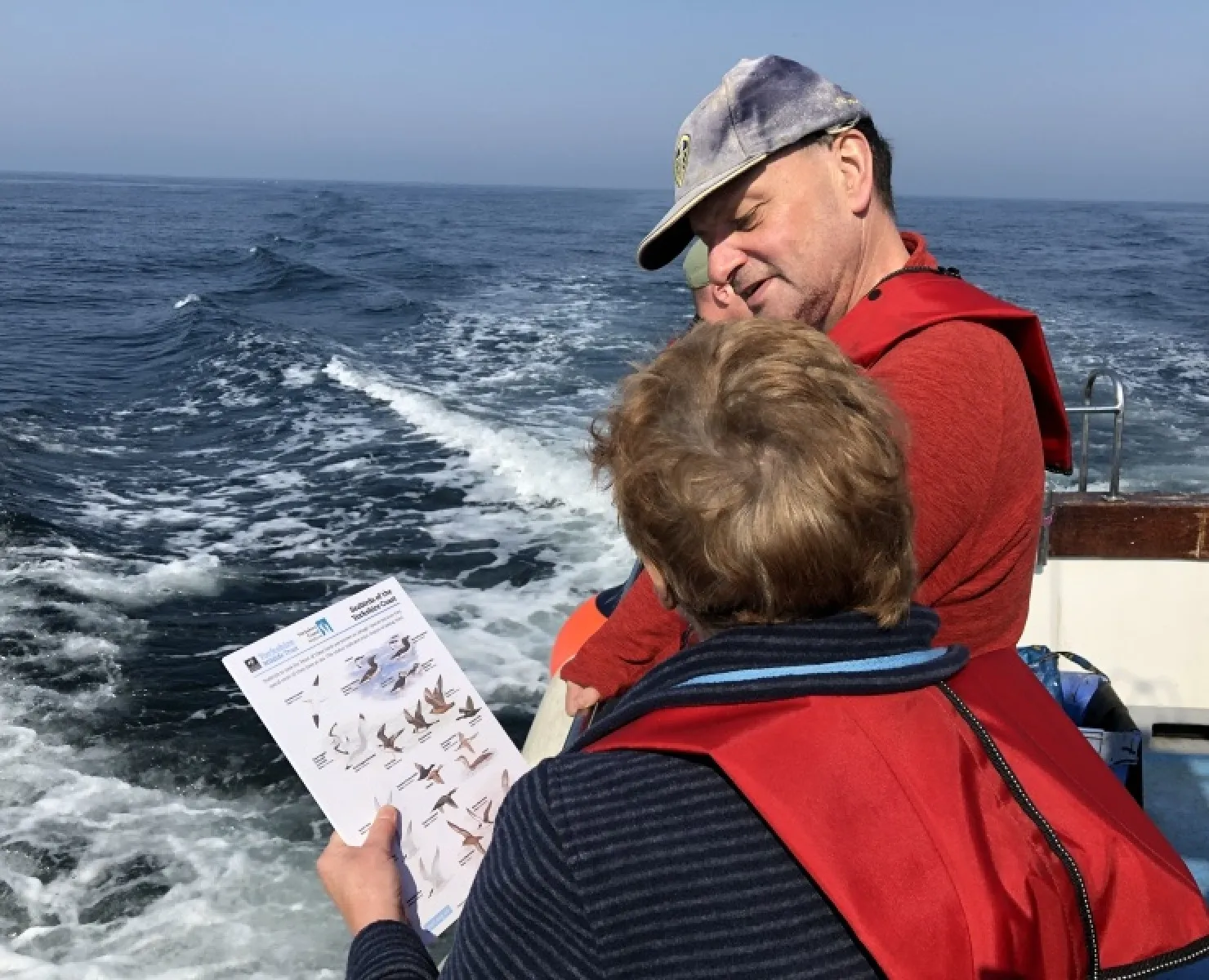 Two people on a wildlife cruise off the Yorkshire coast, summer activities n Yorkshire in 2026.