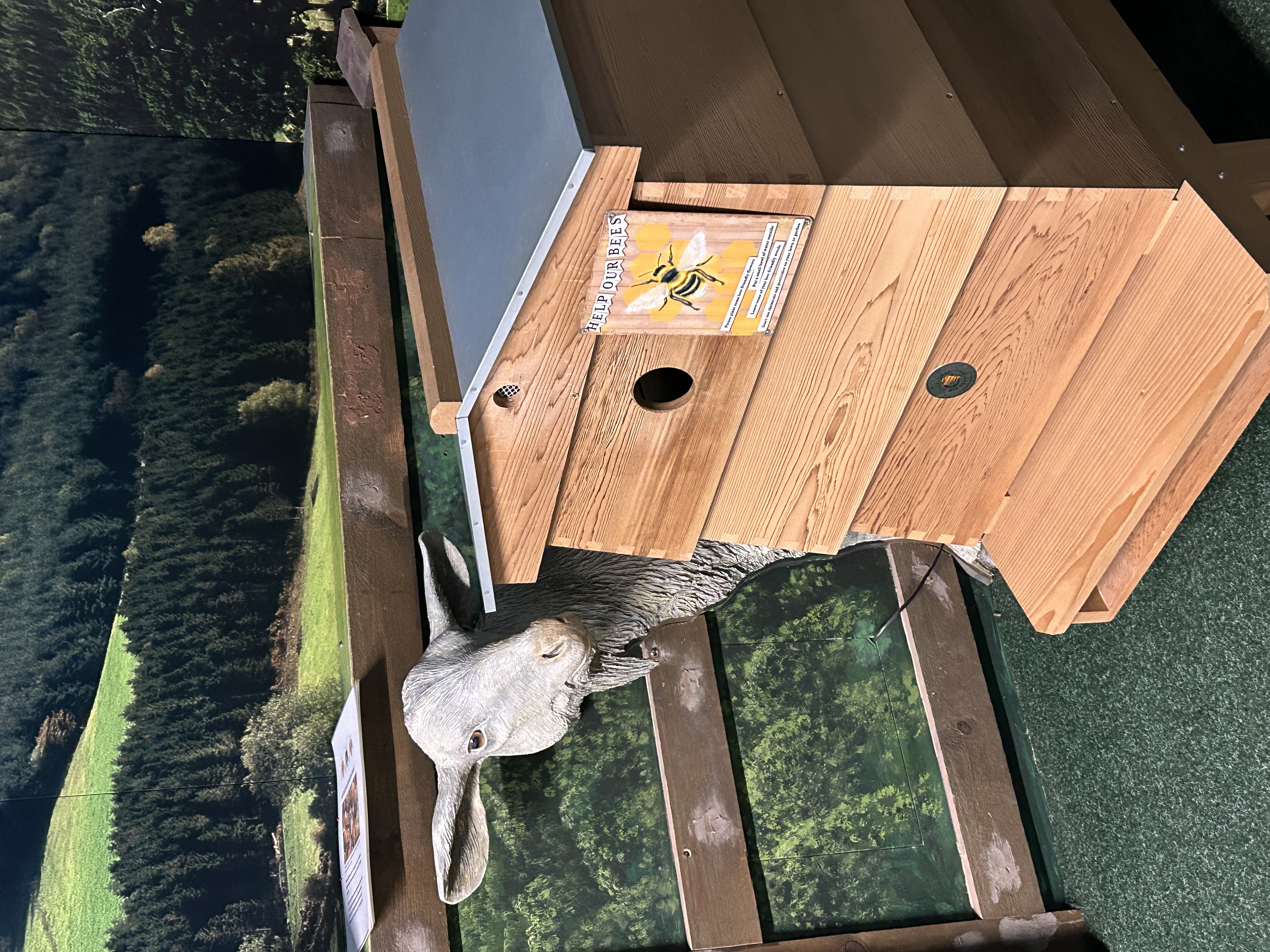 bee hive and gost figure in the children's interactove gallery at World of James Herriot Museum