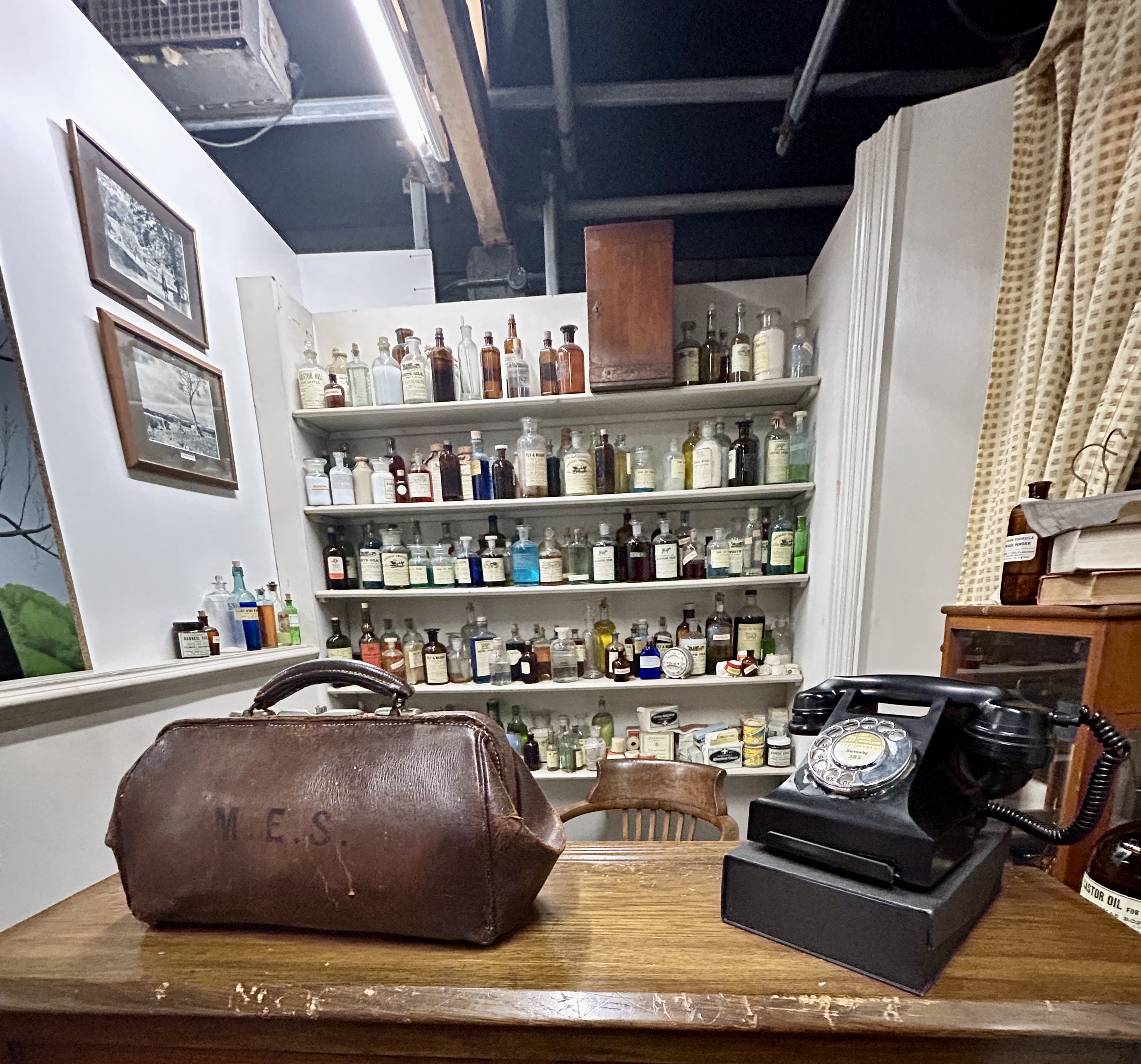 dispensary from the 1970's version of All Creatures Great and Small with Vets leather bag and 1940's telephone