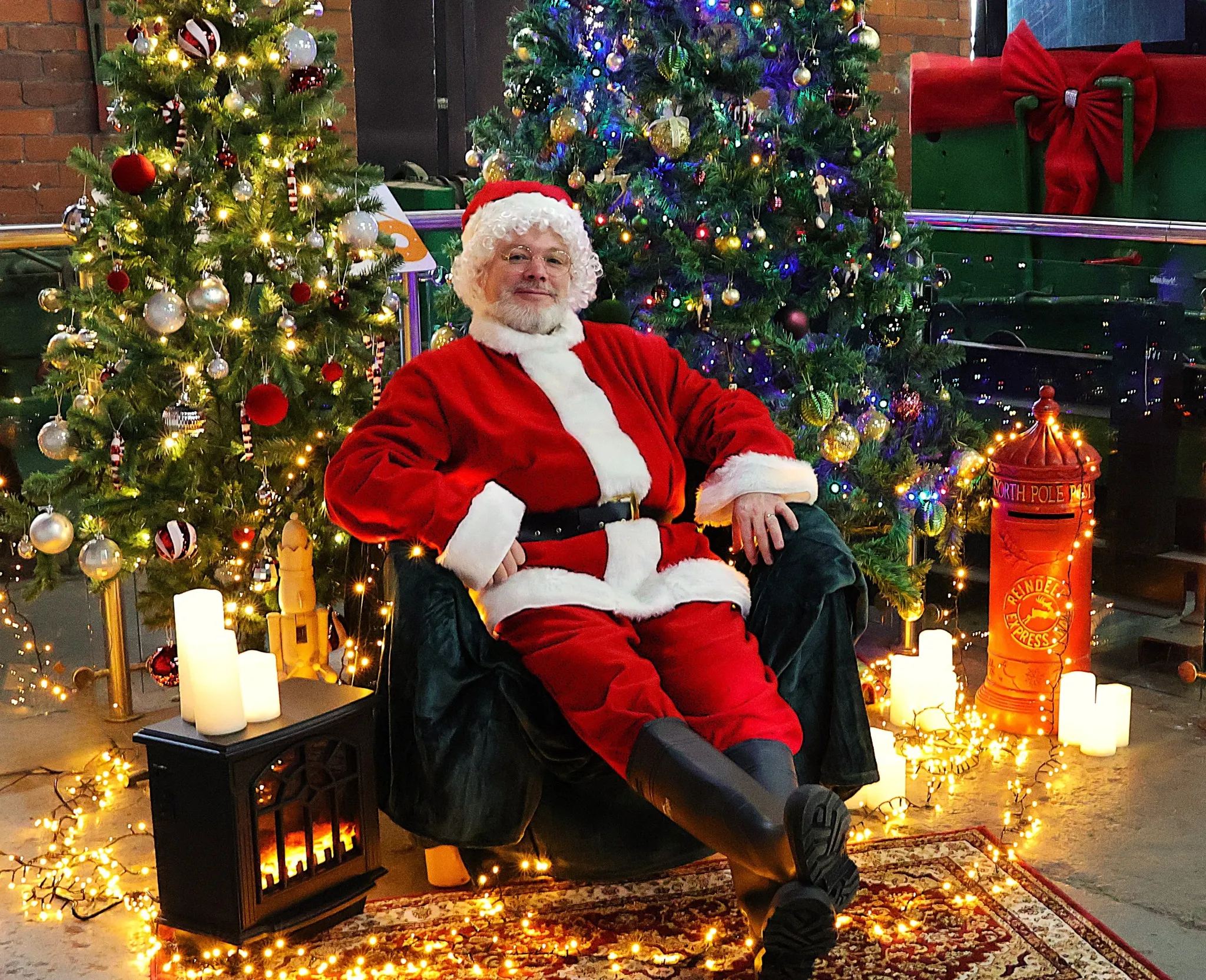Father Christmas sitting in his armchair.