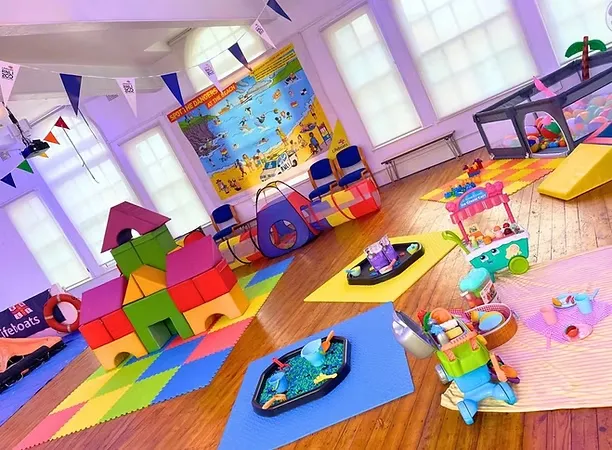 brightly coloured toys in an event space.