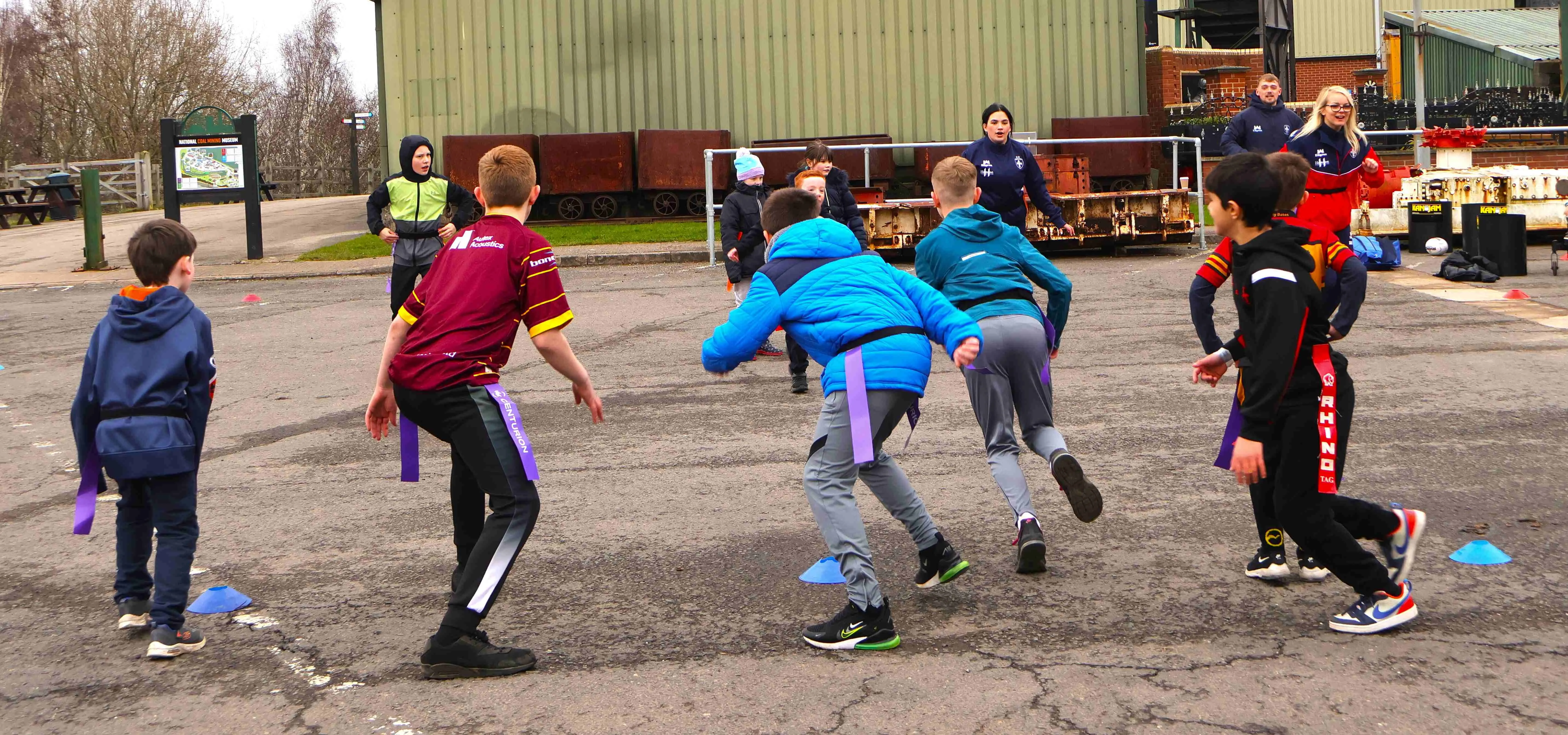 Children playing tag rugby at the National Coal Mining Museum, Yorkshire event in March 2026