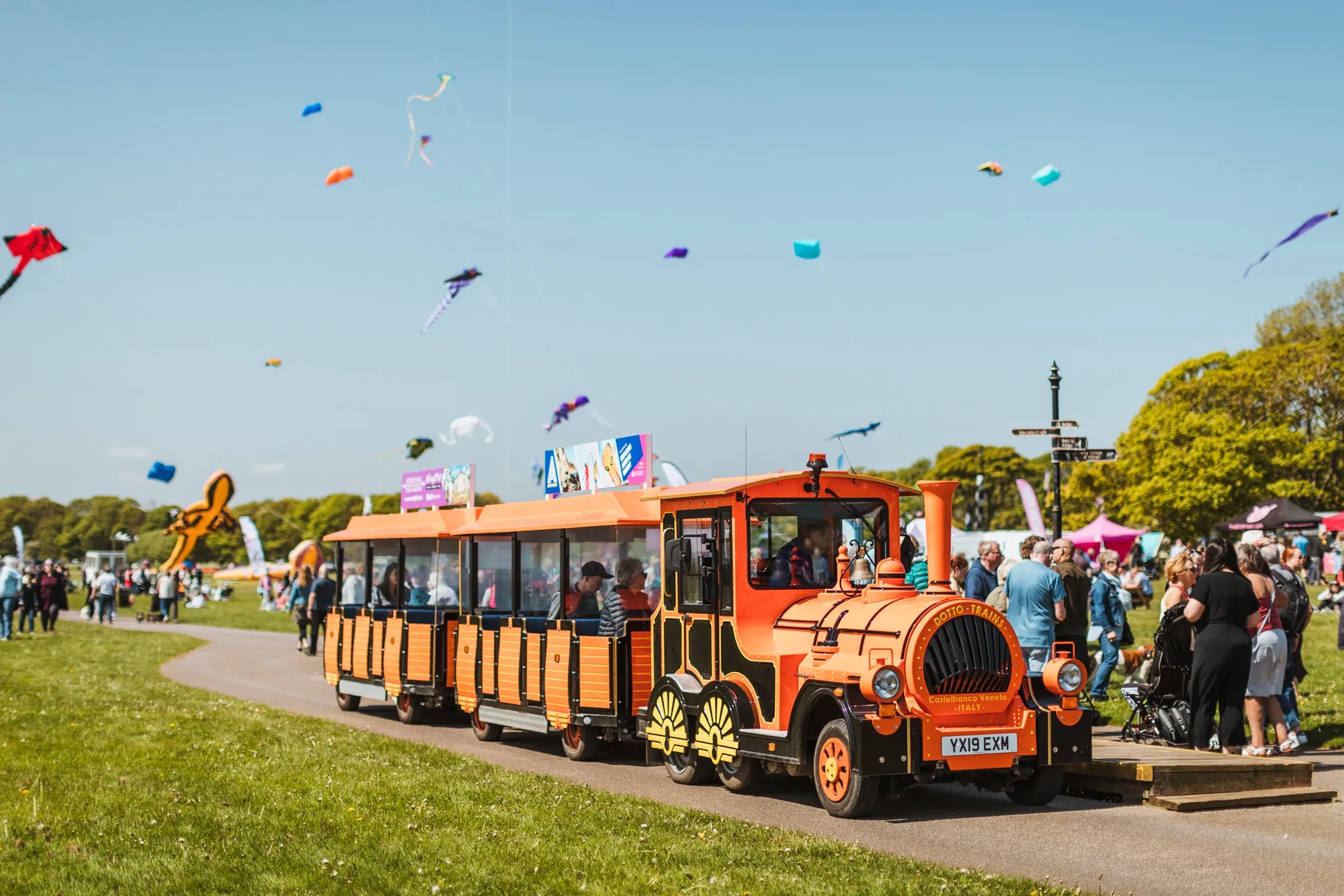 Land Train taking visitors along the coast at Bridlington to the Kite Festival